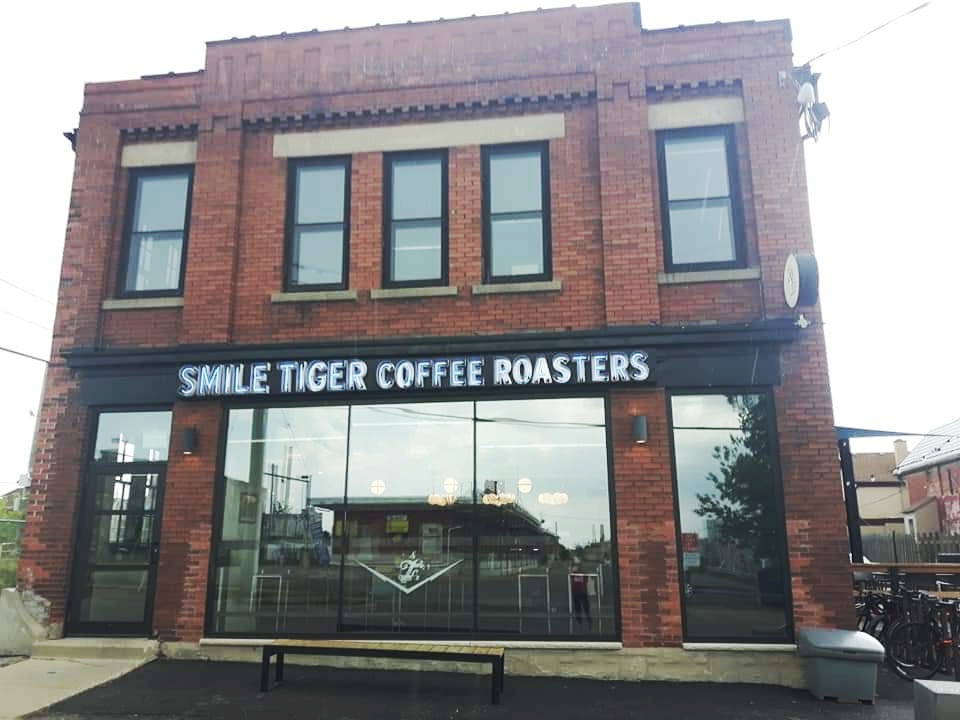 Smile Tiger Coffee Roasters is situated in a unique building directly across from the Kitchener train station.
